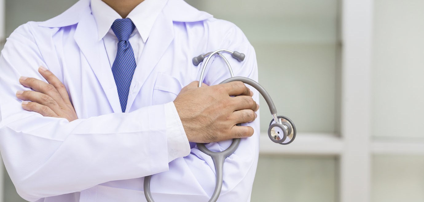 Doctor with stethoscope in a hospital Doctor with stethoscope in a hospital